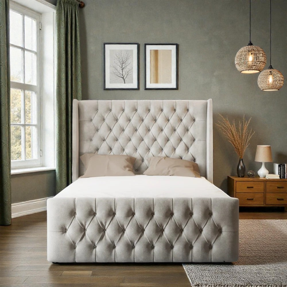 Mara wingback Ottoman storage bed frame with padded headboard and sturdy wooden legs, shown in a modern bedroom setting.