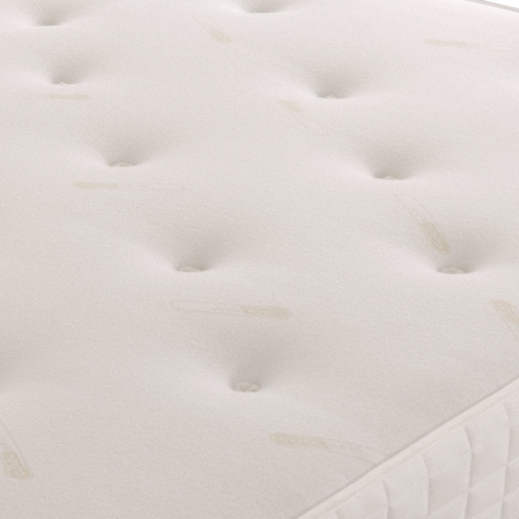 Orthopaedic Pearl Mattress showing plush surface with pearl-like fabric and supportive structure for comfortable sleep.