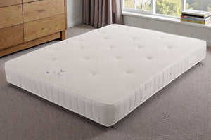 Venice divan bed set with button-tufted headboard and matching base, in a neutral fabric, by Mattress Supermarket.