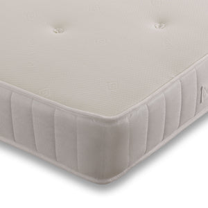 Aleena Sprung Memory Mattress from Mattress Supermarket showing a neatly made bed with white bedding and a plush headboard.