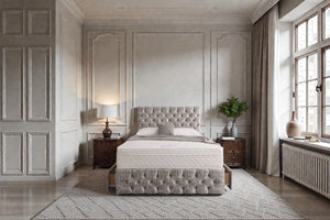 Divan bed set with tall button-tufted headboard and matching footboard, featuring elegant design in neutral fabric.