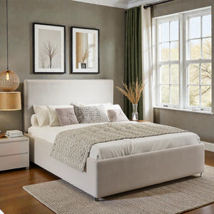 Alva Ottoman Storage Bed Frame in neutral fabric with a padded headboard and hidden storage compartments, designed for mattress support.