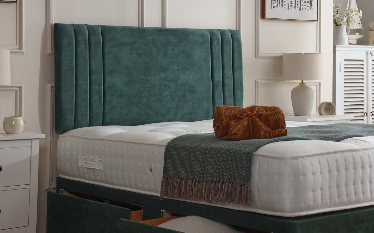 Athens divan bed set with matching headboard, featuring a sleek upholstery and modern design for a stylish bedroom setup.