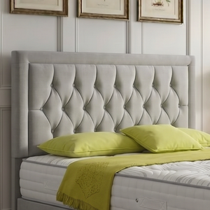Belgrave divan bed set with a button border headboard, featuring a stylish upholstered design for a modern bedroom.