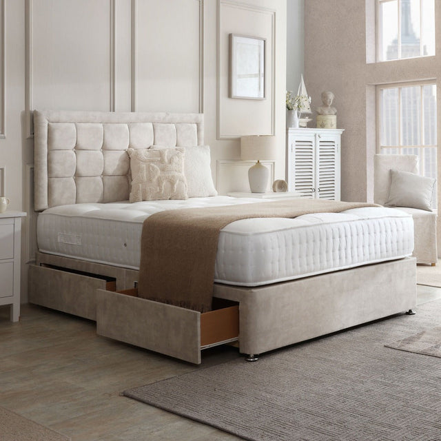 Chelsea divan bed set with button border headboard, featuring a plush mattress and stylish fabric upholstery for a modern bedroom look.