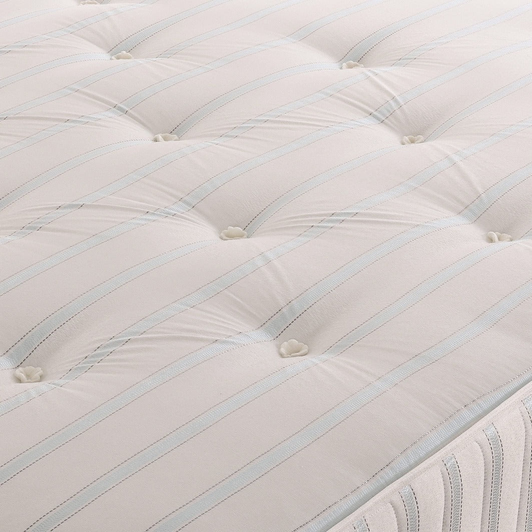 Orthopaedic Dehlia sprung mattress with plush fabric cover, showcasing its supportive design and high-quality construction.