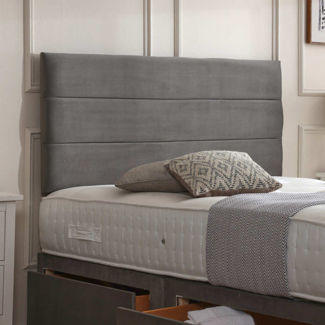 Florence upholstered headboard from Mattress Supermarket showcasing its plush fabric and stylish design for a modern bed setup.