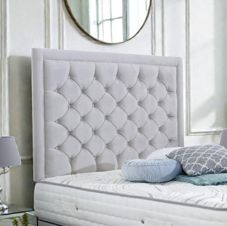 Jamie divan bed set with tall button-tufted headboard and footboard, featuring a sleek design and sturdy construction.