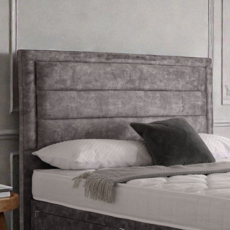 Upholstered Sofia border headboard in a soft fabric, featuring a stylish design, perfect for a modern bedroom.