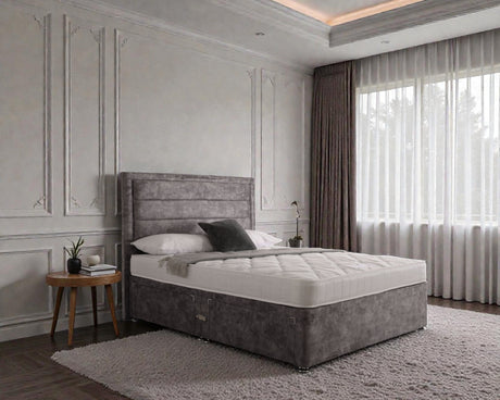 Sofia divan bed set with border headboard, upholstered in fabric, shown in a modern bedroom setting.