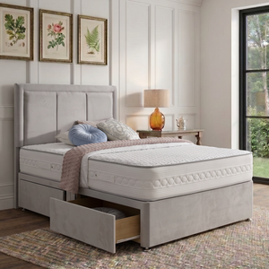 Lyon divan bed set with border headboard featuring a modern upholstered design in a bedroom setting.