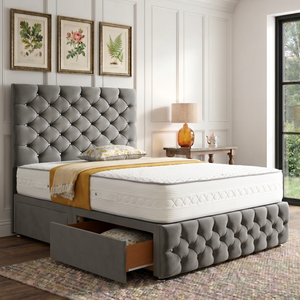 Monarch divan bed set with tall button-tufted headboard and matching footboard, featuring sleek fabric upholstery.