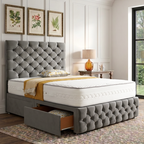 Monarch divan bed set with tall button-tufted headboard and matching footboard, featuring sleek fabric upholstery.