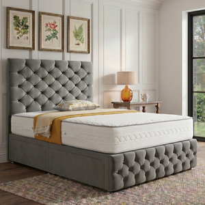 Monarch divan bed set with tall button-tufted headboard and matching footboard, featuring a sleek fabric upholstery.