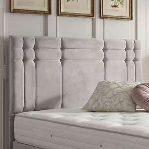 Oslo divan bed set with a stylish button-tufted headboard, featuring a modern design and plush fabric upholstery.