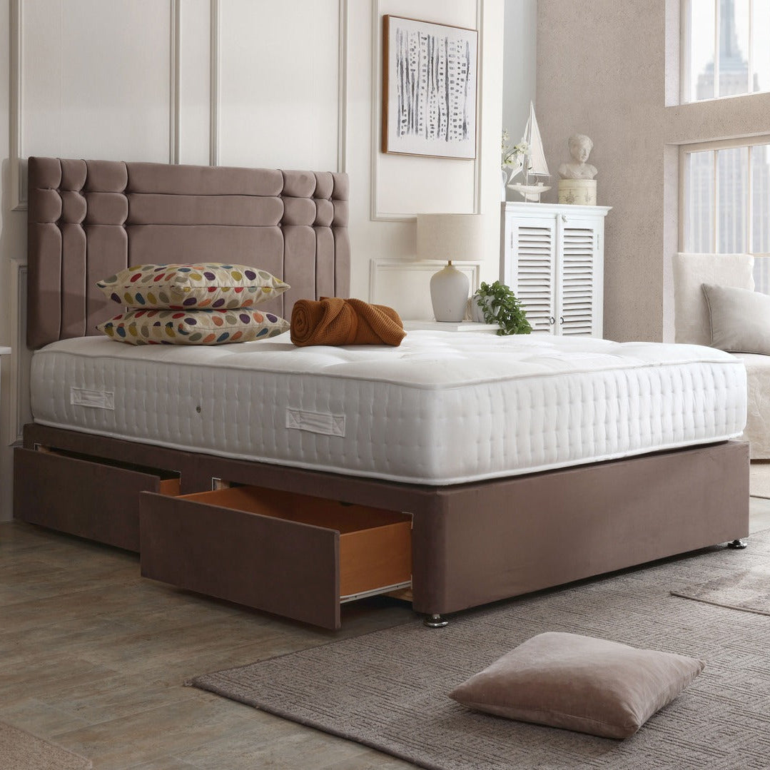 Oslo divan bed set with button-tufted headboard, including mattress and base, in a modern bedroom setting.