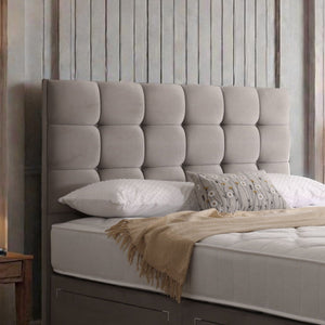 Naples divan bed set with tall button-tufted headboard and matching footboard, in a modern bedroom setting.