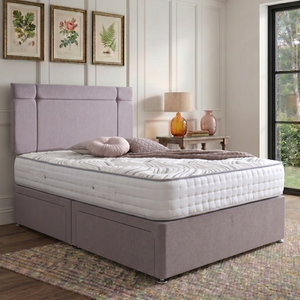 Prague divan bed set with button-tufted headboard in a modern bedroom setting, featuring a comfortable mattress and sleek design.