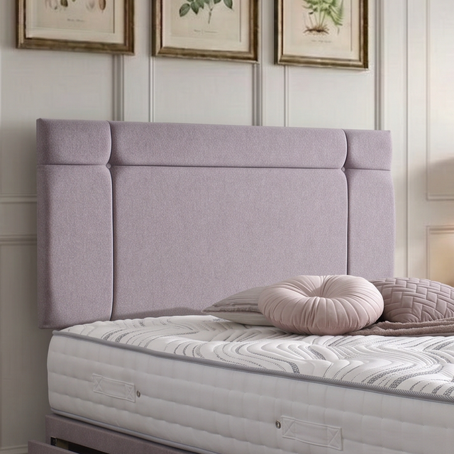 Prague divan bed set with a stylish button-tufted headboard, featuring a plush fabric upholstery and clean modern design.