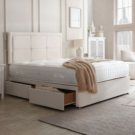 Riga divan bed set with button border headboard, beige fabric upholstery, and matching base for a modern bedroom look.