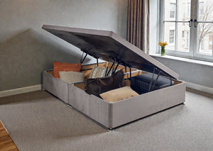 Side lift ottoman storage divan bed base with upholstered fabric and sturdy construction, designed for convenient under-bed storage.