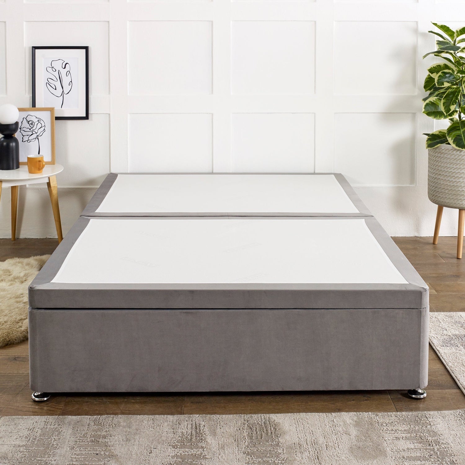 Side lift ottoman storage divan bed base with upholstered fabric and sturdy frame, designed for Mattress Supermarket.