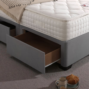 Madrid divan bed set with button-tufted headboard, featuring a sleek, modern design and plush fabric for a stylish bedroom look.