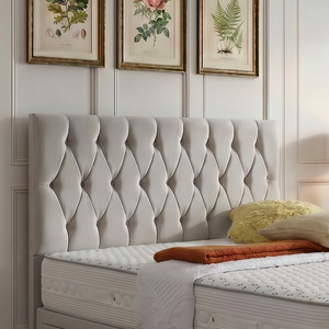 Zurich divan bed set with button-tufted headboard, featuring a sleek upholstered design and sturdy wooden legs.