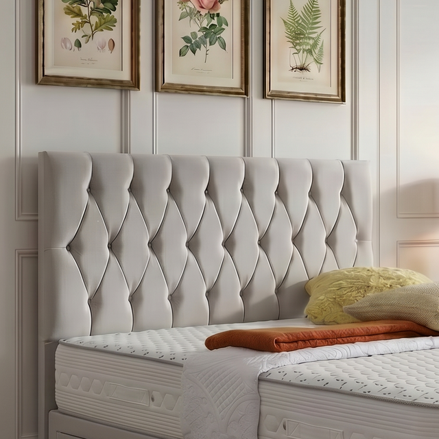 Zurich divan bed set with button-tufted headboard, featuring a sleek upholstered design and sturdy wooden legs.